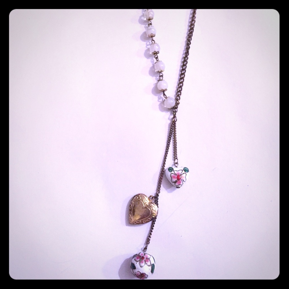 Long floral locket necklace